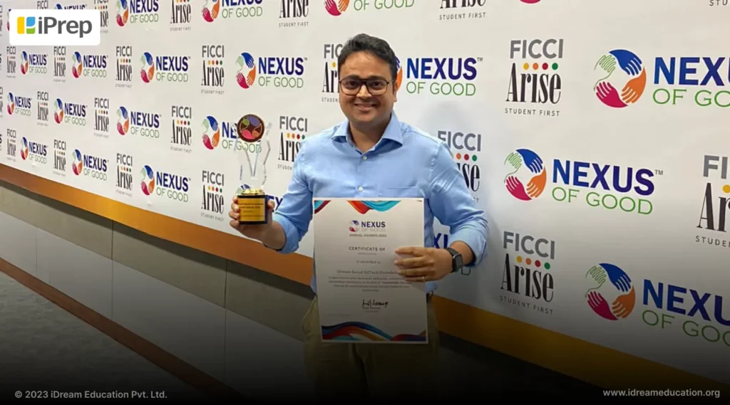Image of Rohit Prakash the co-founder of iDream Education receiving Nexus of Good award for iPrep app